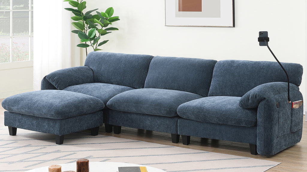 Spacious blue sectional sofa with chaise lounge and USB charging port. Ideal for cozy living rooms with modern decor and natural lighting.