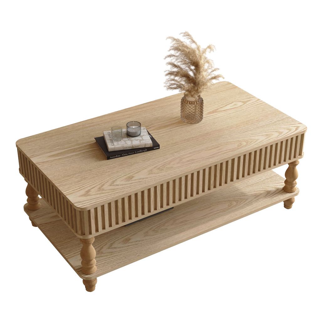 Top-down view of solid wood lift top coffee table with fluted sides and decorative items, ideal for modern home decor.