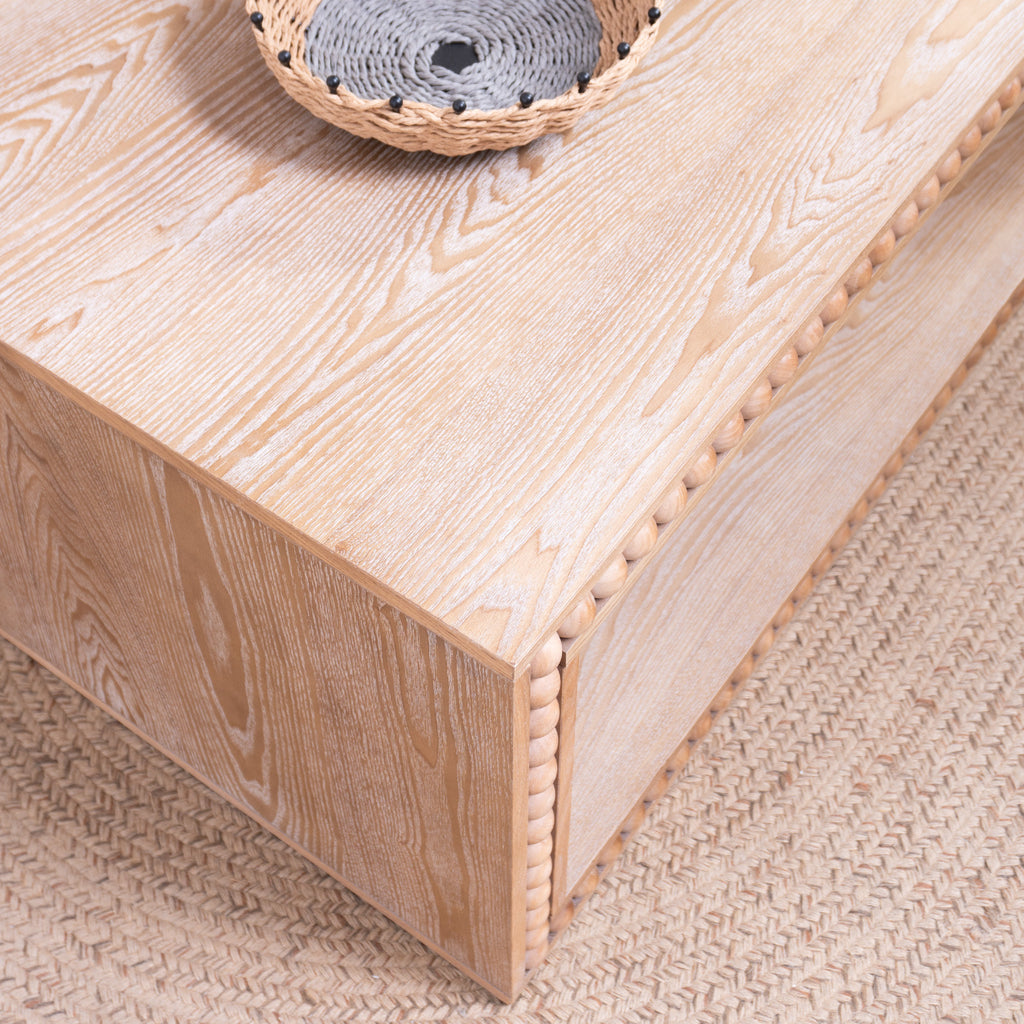 Close-up of tabletop on Rustic Beaded Edge Coffee Table showing natural wood grain and smooth hand-painted finish.