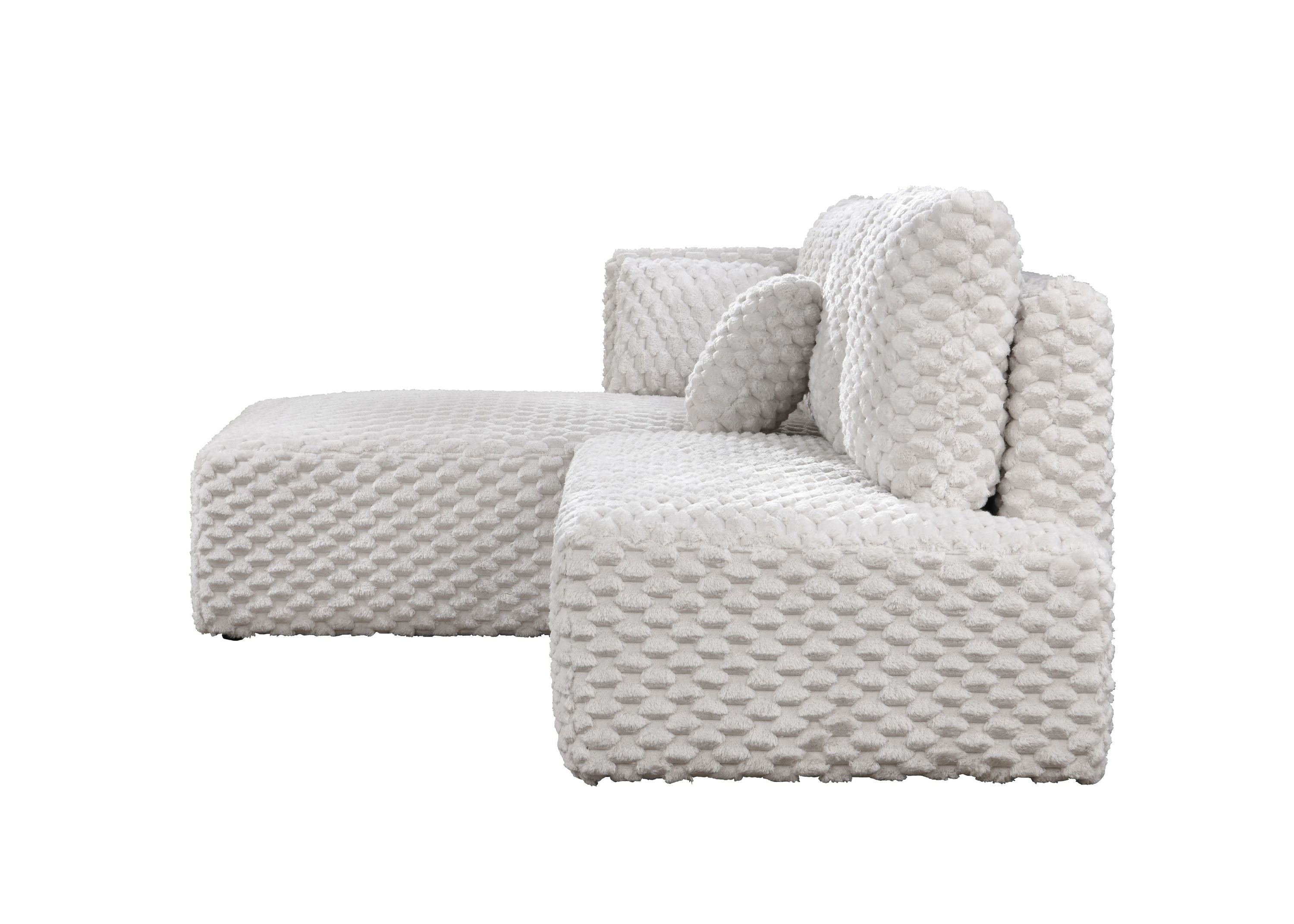 Side view of Ivory Corduroy Sectional Sofa highlighting its textured corduroy fabric and low-profile, cozy seating design.