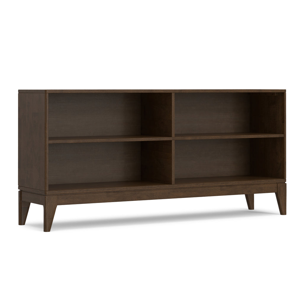 Mid-century modern low bookcase in walnut brown solid wood with four open storage compartments and tapered legs.