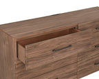 Open drawer of walnut dresser showing spacious interior. Smooth glide drawers enhance functionality and storage capacity.