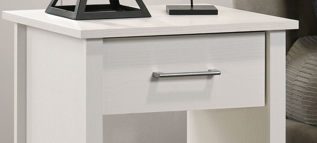 Top drawer of Celeste White Nightstand with sleek metal handle. Minimalist design ideal for modern bedroom storage.