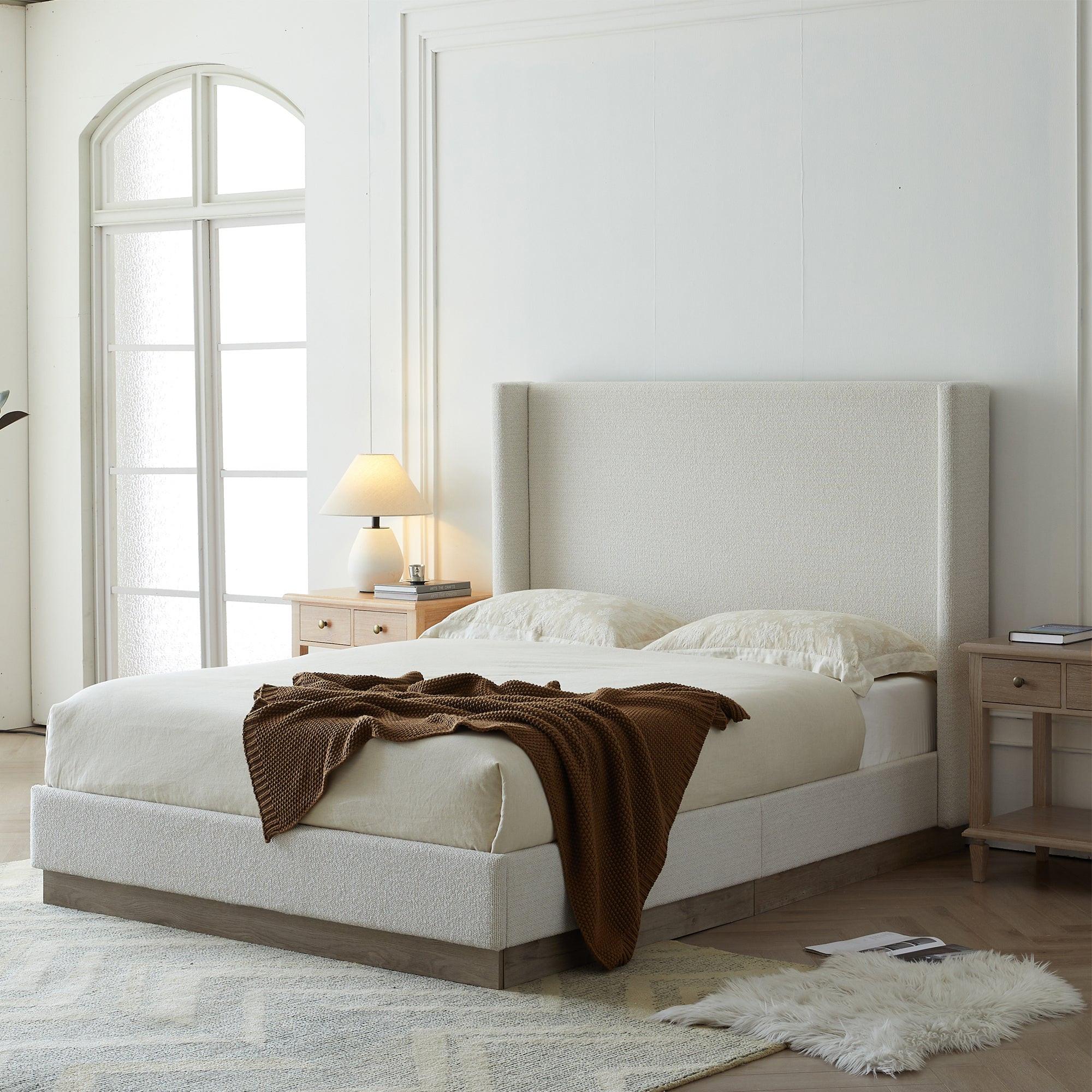 Hosford Minimalist Upholstered Wingback Bed - California King.