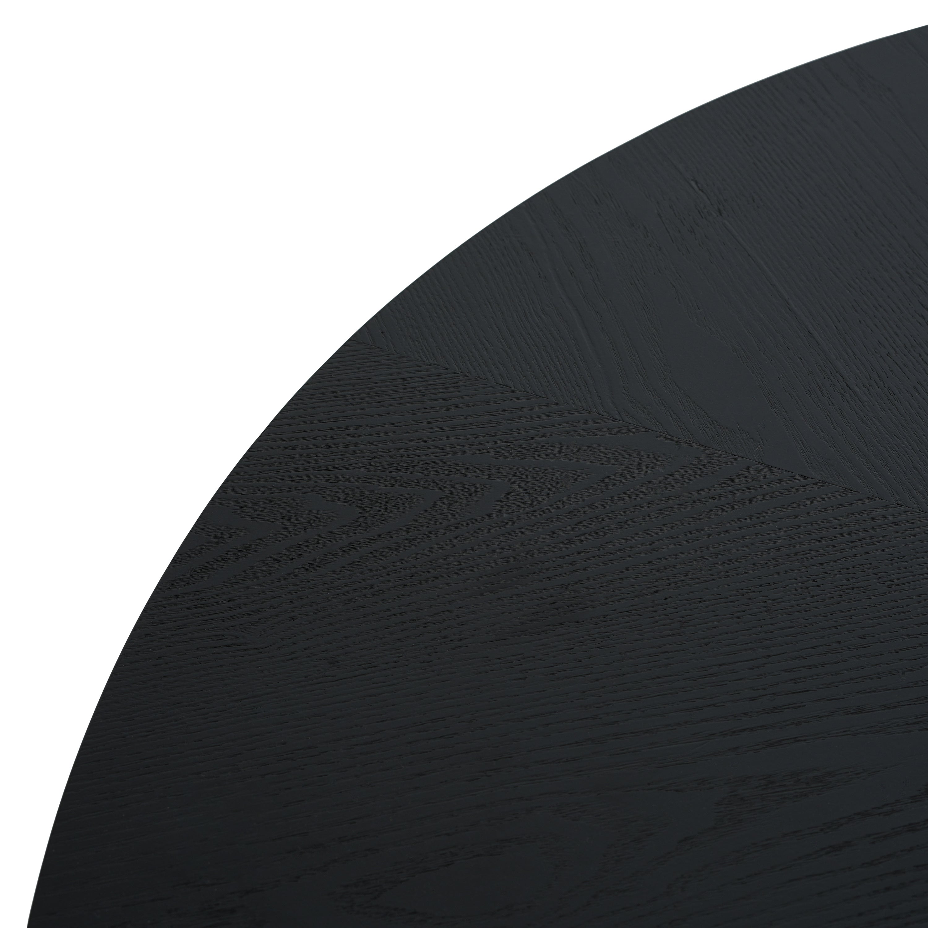 Detail of black round tabletop edge with wood grain finish. Smooth and sleek design complements modern interiors.