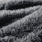 Detailed view of dark grey plush fabric on the Modular Sofa, emphasizing softness and high-quality material.