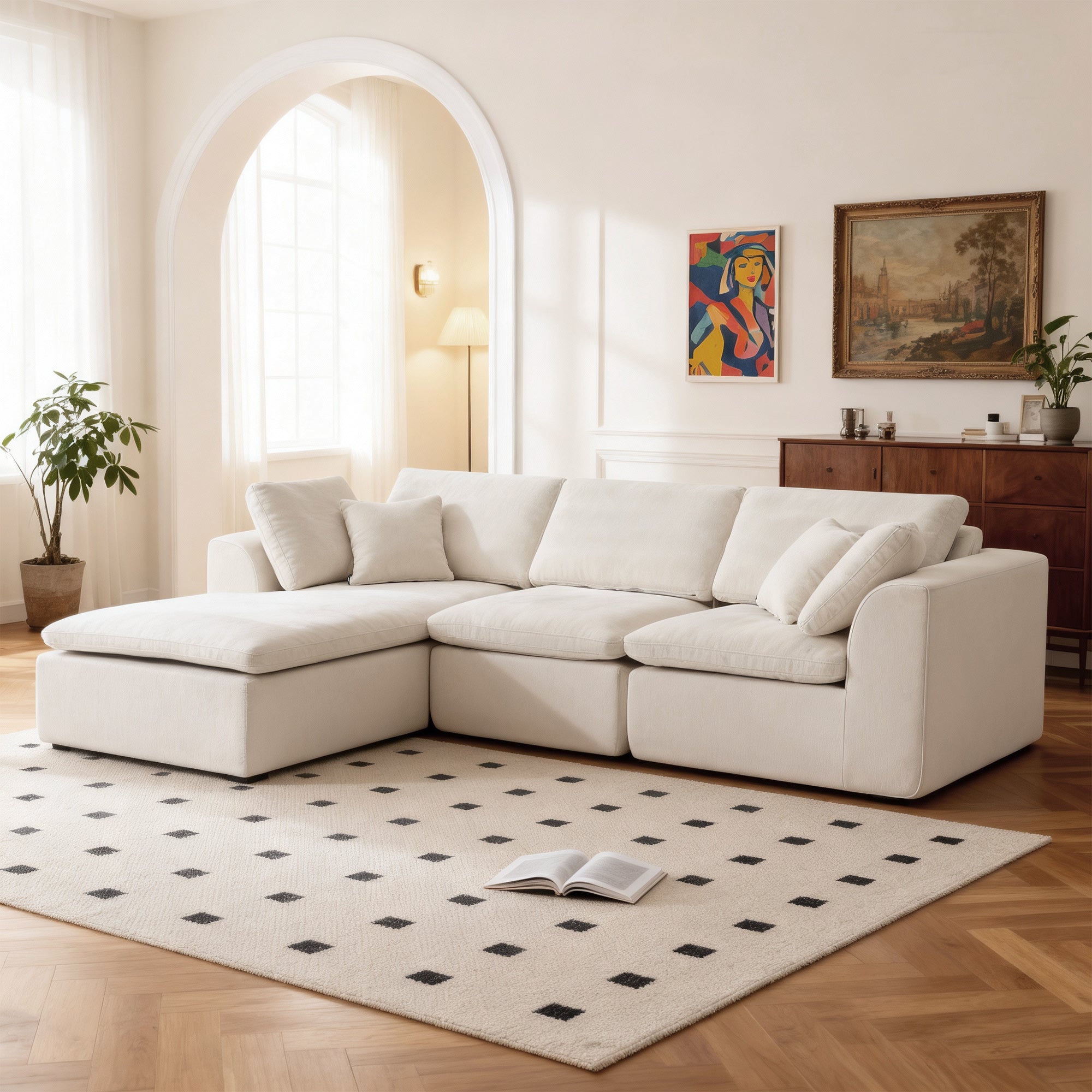 L-Shaped Sectional Sofa - Modern Corduroy Couch in cream color with chaise lounge, set in a bright living room with wood flooring and decor.