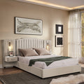 Queen upholstered bed frame in velvet with vertical stripe headboard, storage drawers, and adjustable wall lamps in a modern bedroom.