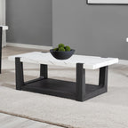 Stylish modern coffee table faux marble with black base and white top, enhancing a minimalist living room interior.