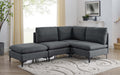 Dark gray linen modular sectional sofa with plush cushions and sleek black metal legs on a patterned area rug.