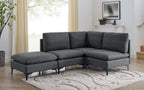 Dark gray linen modular sectional sofa with plush cushions and sleek black metal legs on a patterned area rug.