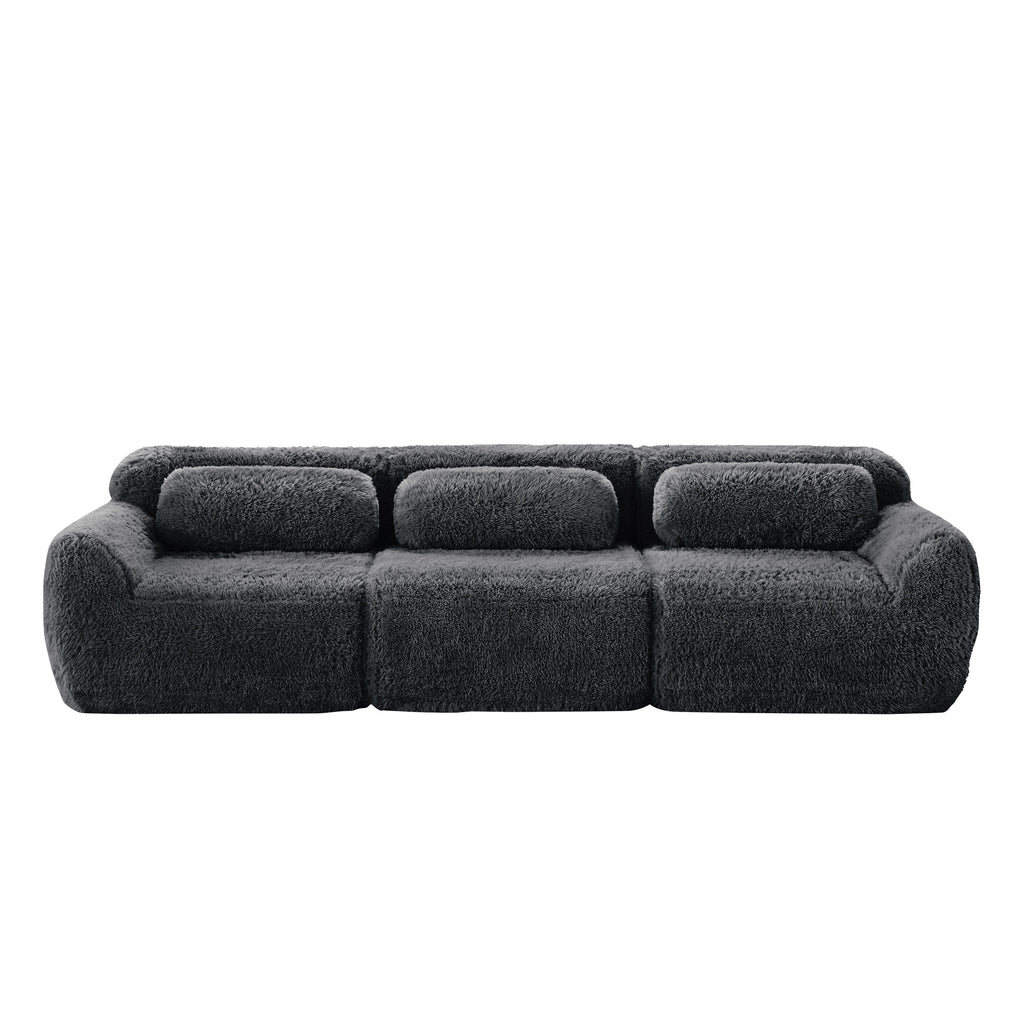 Modular Sectional Sofa - Comfortable & Versatile Design in dark plush fabric with three seats and matching pillows, perfect for modern interiors.