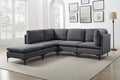Modern charcoal grey linen modular sectional sofa with plush cushions and slim black metal legs in a bright living room.
