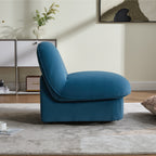 Side profile of velvet swivel accent chair showing thick cushioned seat and armless design on a 360-degree metal base.
