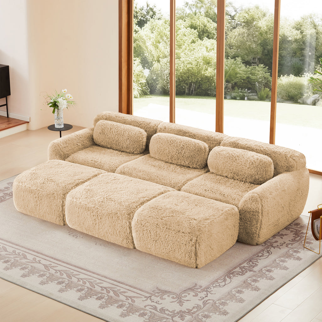 Light khaki modular 3-seater sofa with plush fabric and no assembly required, placed in a modern living room with large windows.