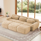 Light khaki modular 3-seater sofa with plush fabric and no assembly required, placed in a modern living room with large windows.