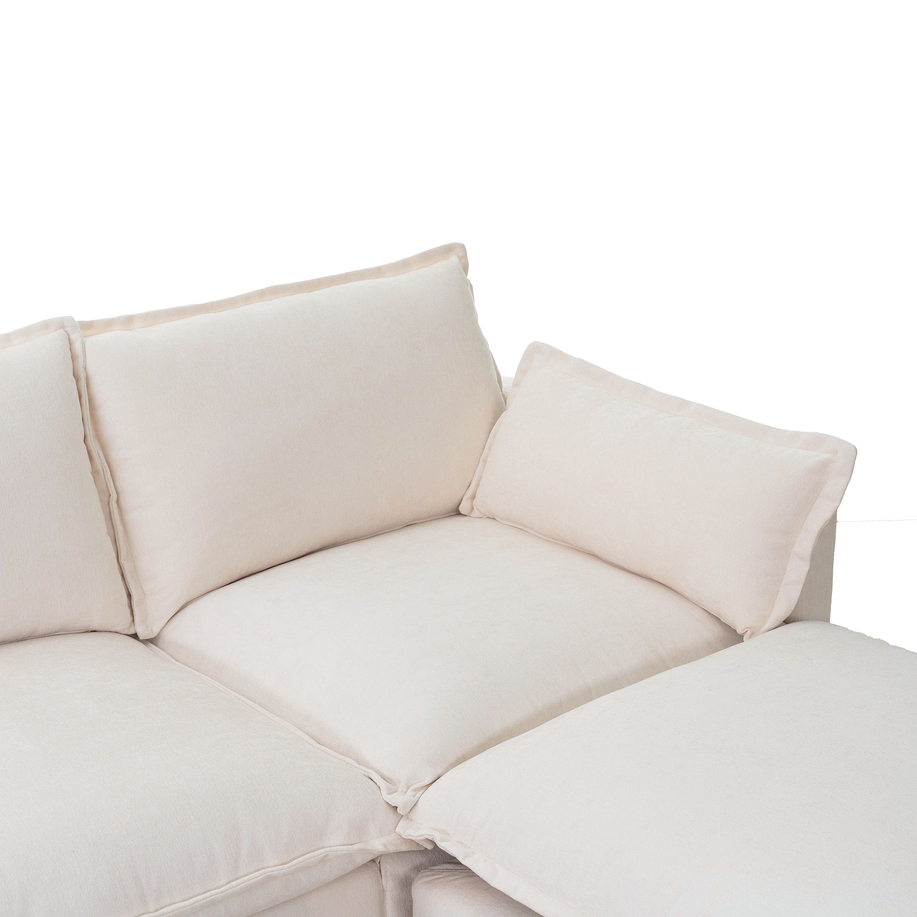 Close-up of the Modern Modular Sectional Sofa's plush cushions and armrest, highlighting its soft fabric and supportive design.