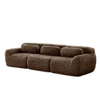 Side angle of 114'' modular sofa in chocolate plush, highlighting its curved armrests and modular build.