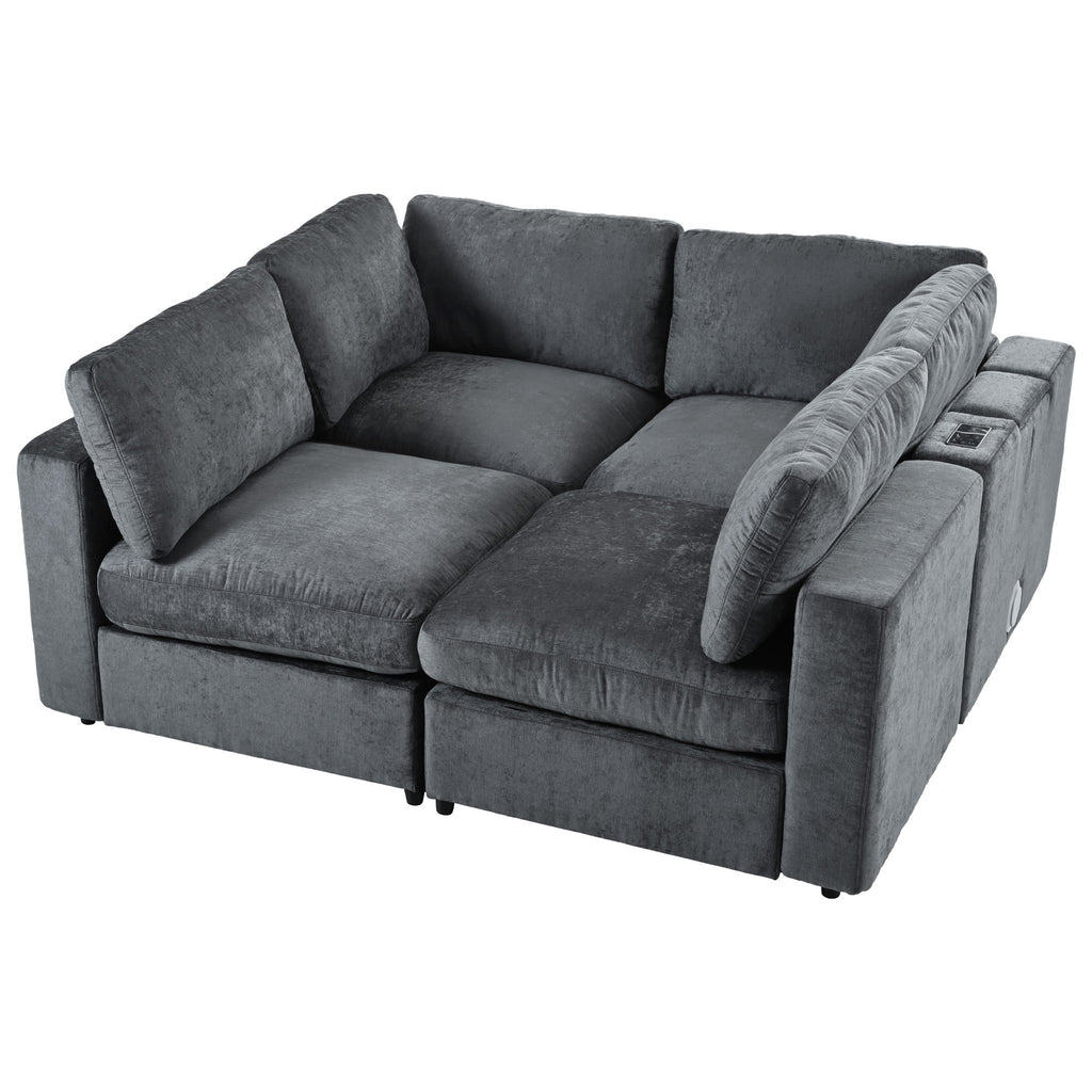 Convertible modular sofa with storage and charging, arranged in a square layout with spacious seating and plush cushions in grey upholstery.