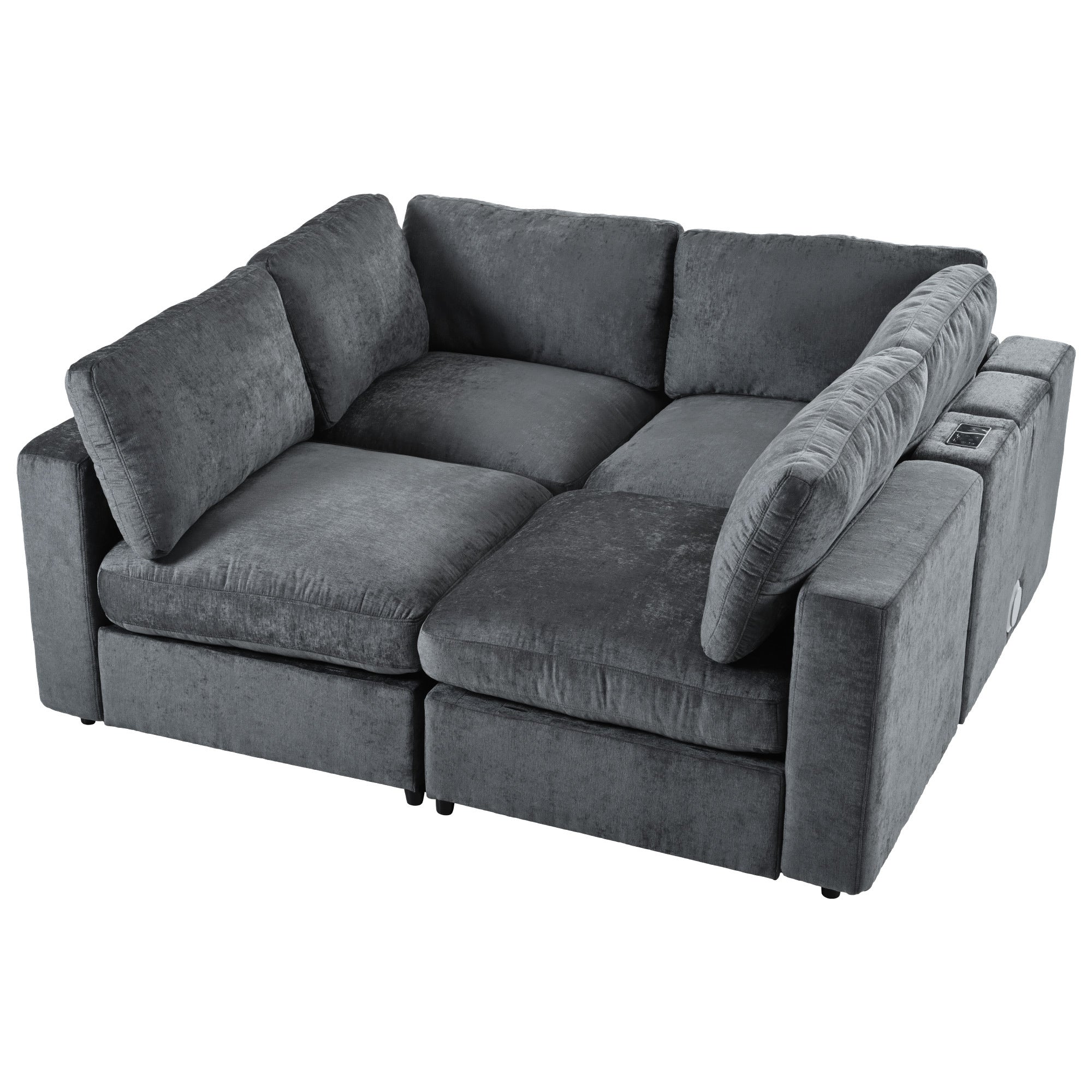 Convertible modular sofa with storage and charging, arranged in a square layout with spacious seating and plush cushions in grey upholstery.