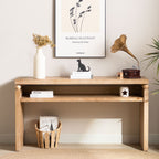 Modern rustic console table styled in an entryway with decor items on top and shelf, showcasing its farmhouse charm and functionality.