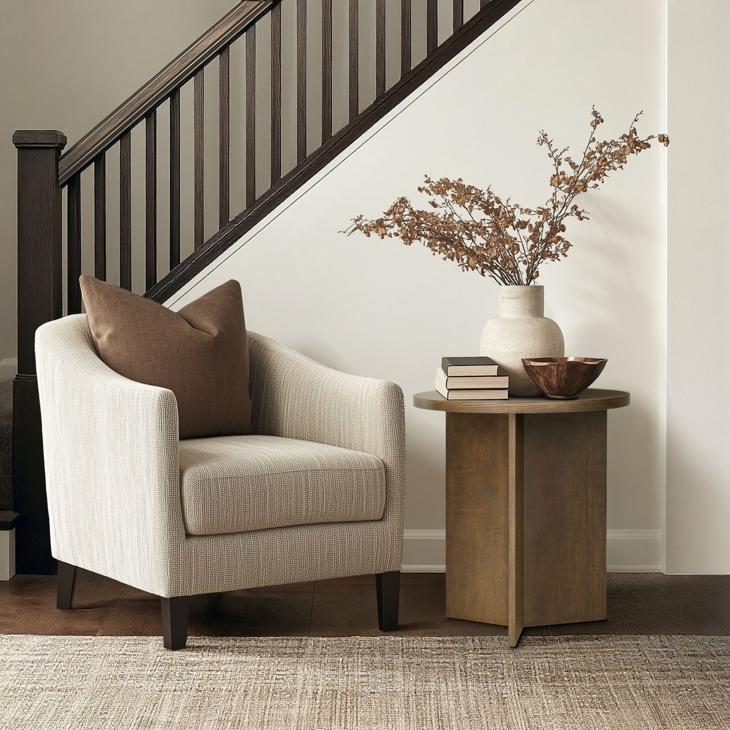 Sadie Walnut Brown Accent Table styled with decor beside an armchair in a cozy corner, ideal for small space furniture arrangements.