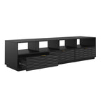 Black coastal style media console with one drawer open, revealing spacious interior for organized media storage.