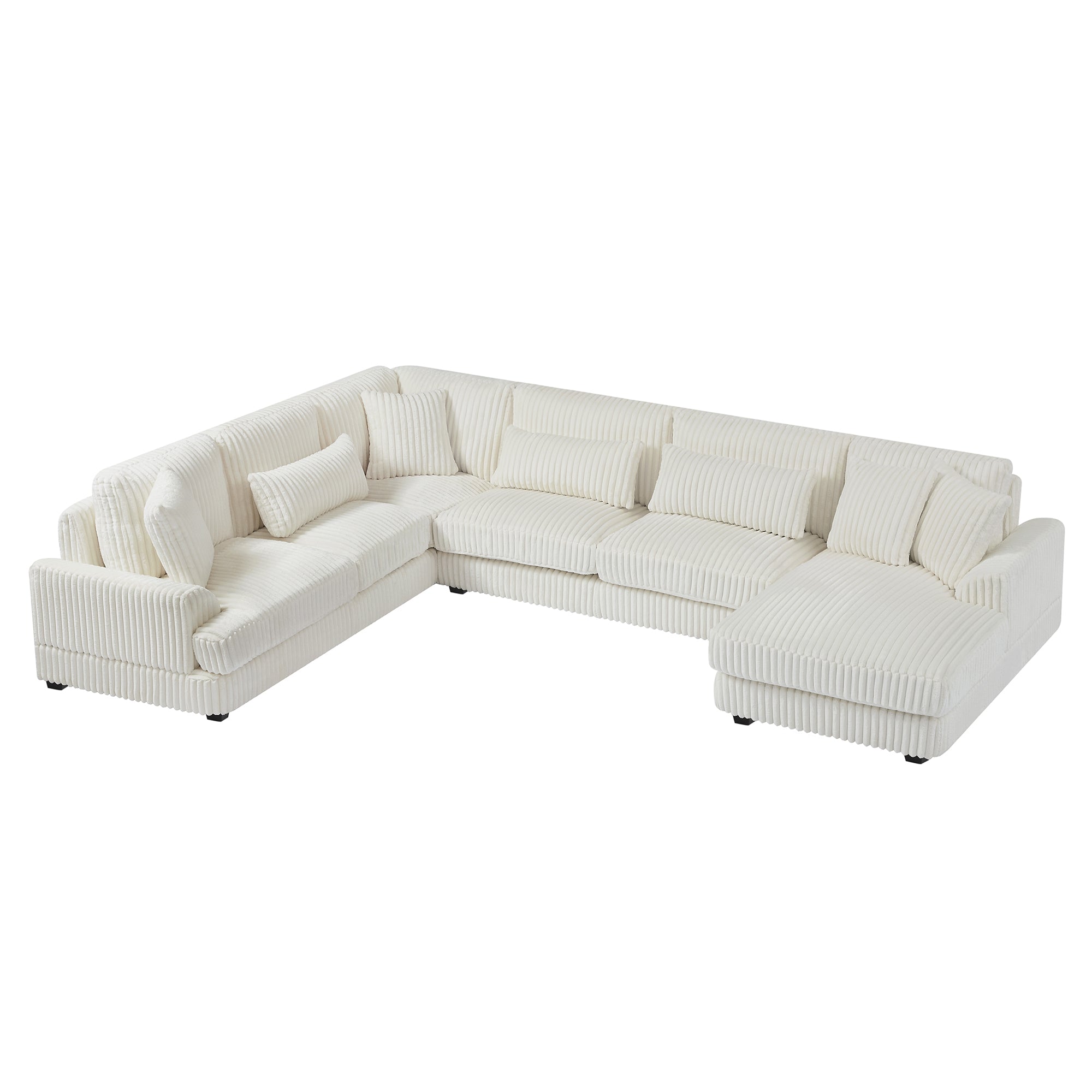Modern oversized U-shaped sectional sofa in beige corduroy with a chaise lounge and plush matching throw pillows.