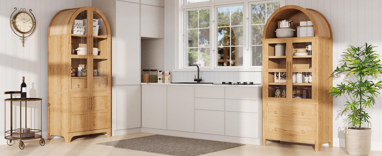 Pair of arched kitchen pantry cabinets in a modern kitchen, providing symmetrical storage with adjustable shelves and natural wood finish.