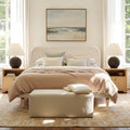 Platform Bed - Beige Upholstered Curved Headboard styled in a bright bedroom with layered bedding and matching nightstands. Elegant and cozy centerpiece.