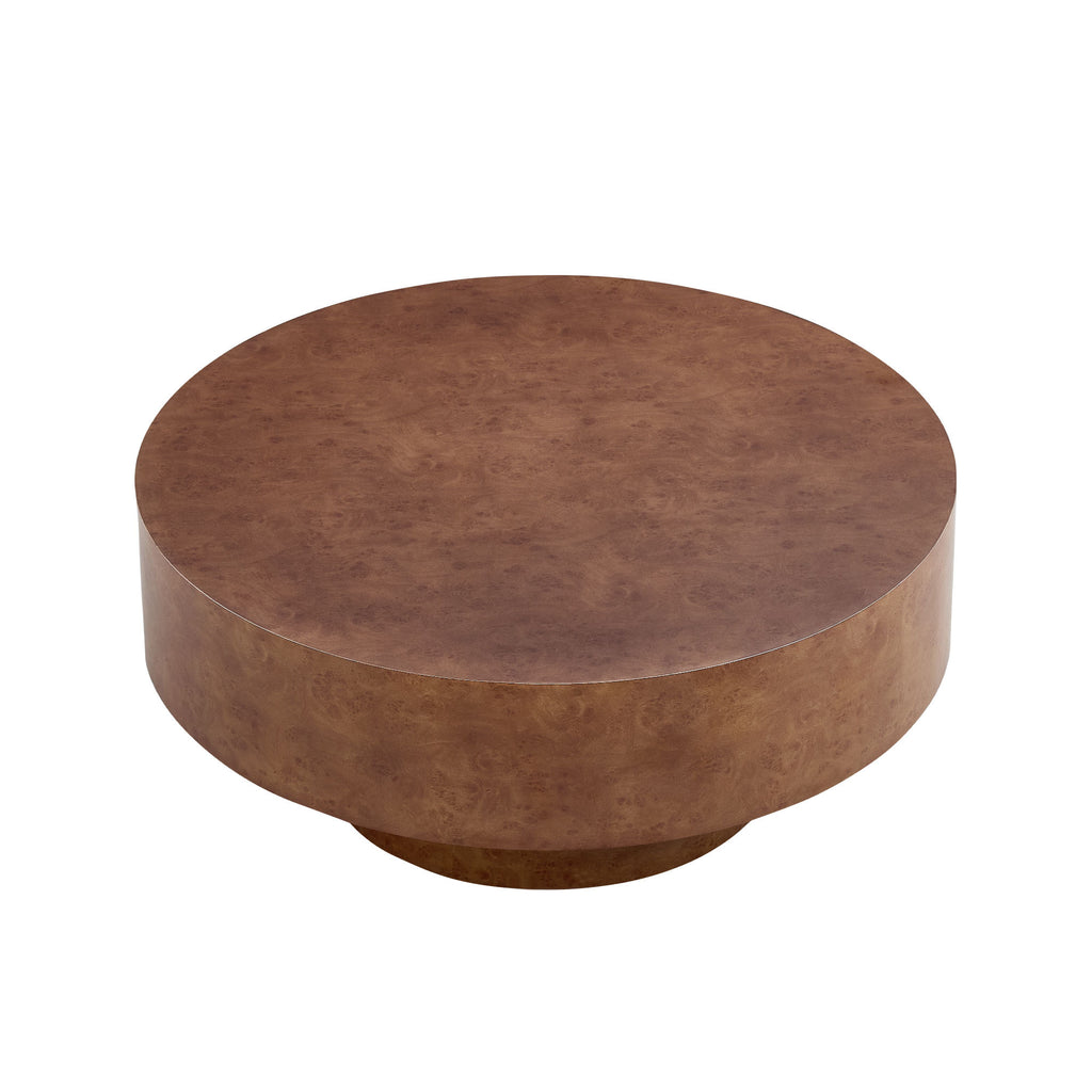 Angled view of Faux Burl Coffee Table with round top and pedestal base, perfect for compact modern living rooms.