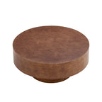 Angled view of Faux Burl Coffee Table with round top and pedestal base, perfect for compact modern living rooms.