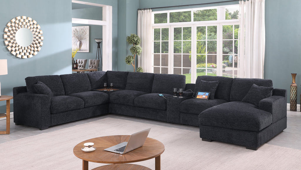 Celine dark gray sectional sofa with chaise, cupholders, and USB ports. Set in a modern living room with natural light and decor.