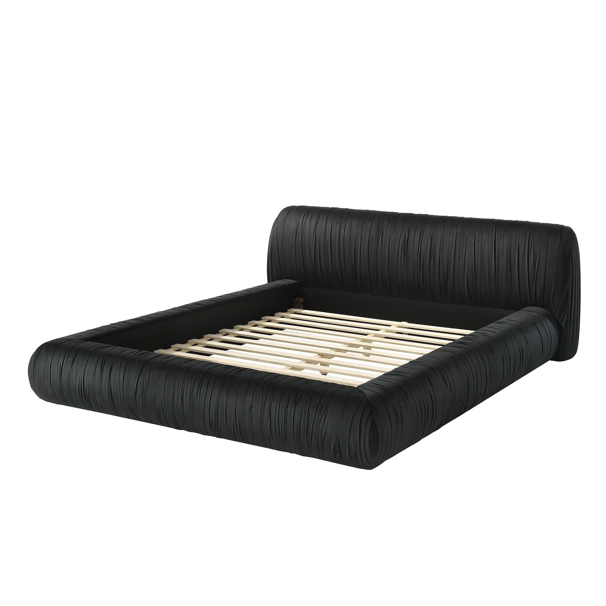 Black Upholstered King Size Bed with Pleated Design.