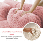 Crushed sponge filling detail of pink modular sofa chaise. Enhances softness and comfort with plush, ergonomic design.