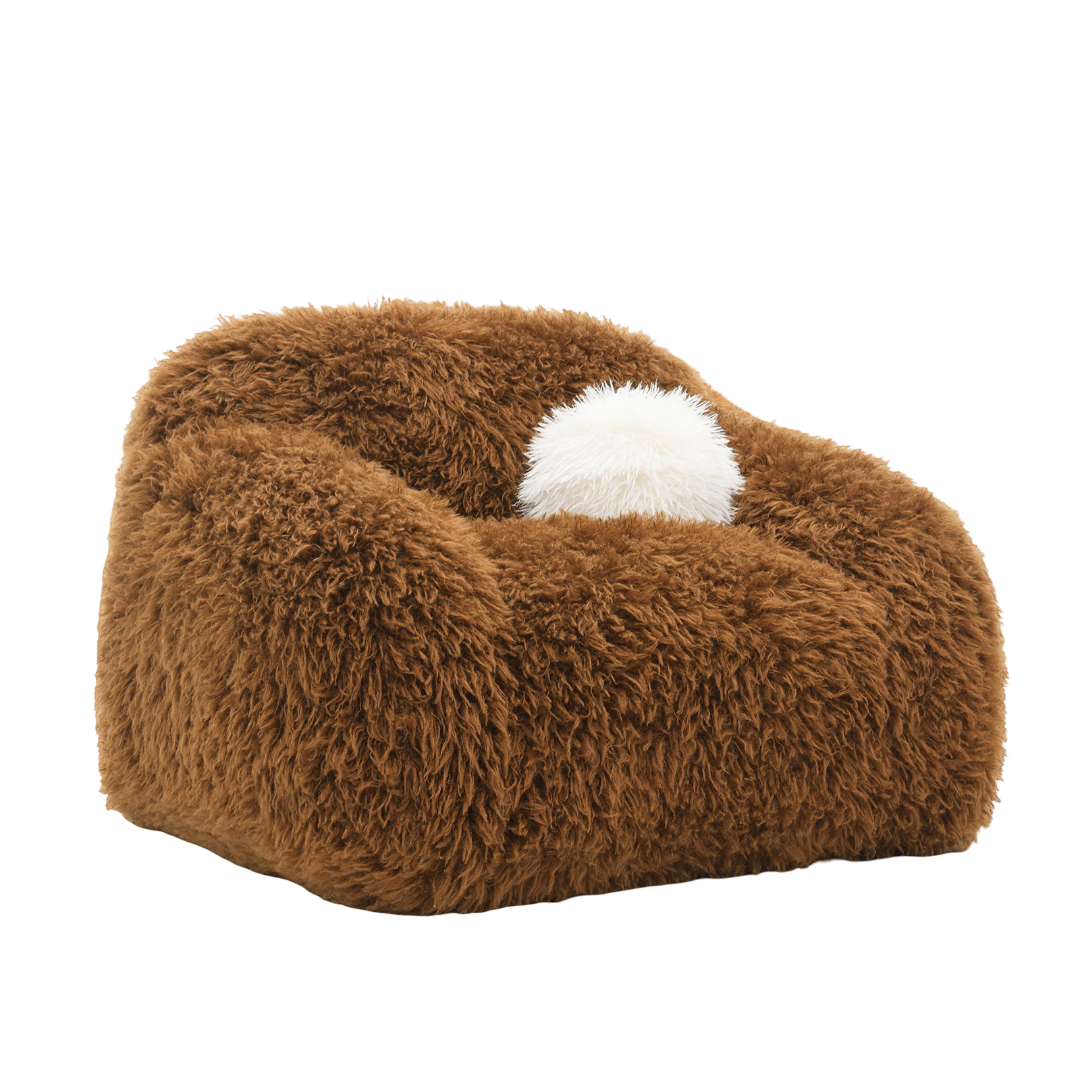 Camel Brown Swivel Chair with plush faux fur texture and included white accent pillow, ideal for cozy contemporary interiors.