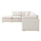 Side angle of modular sectional sofa with ottoman, highlighting plush cushions and versatile configuration for living room comfort.
