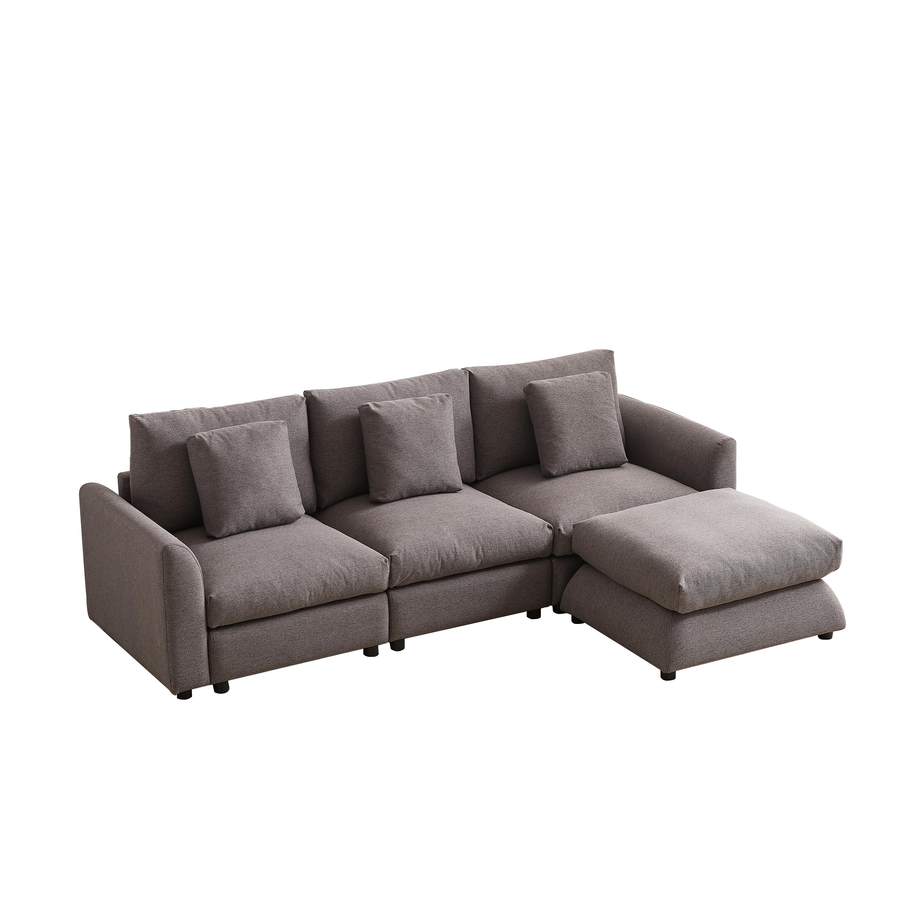 Three-seat modular sofa with right-side ottoman, upholstered in gray fabric and paired with four matching pillows for a cozy, modern look.