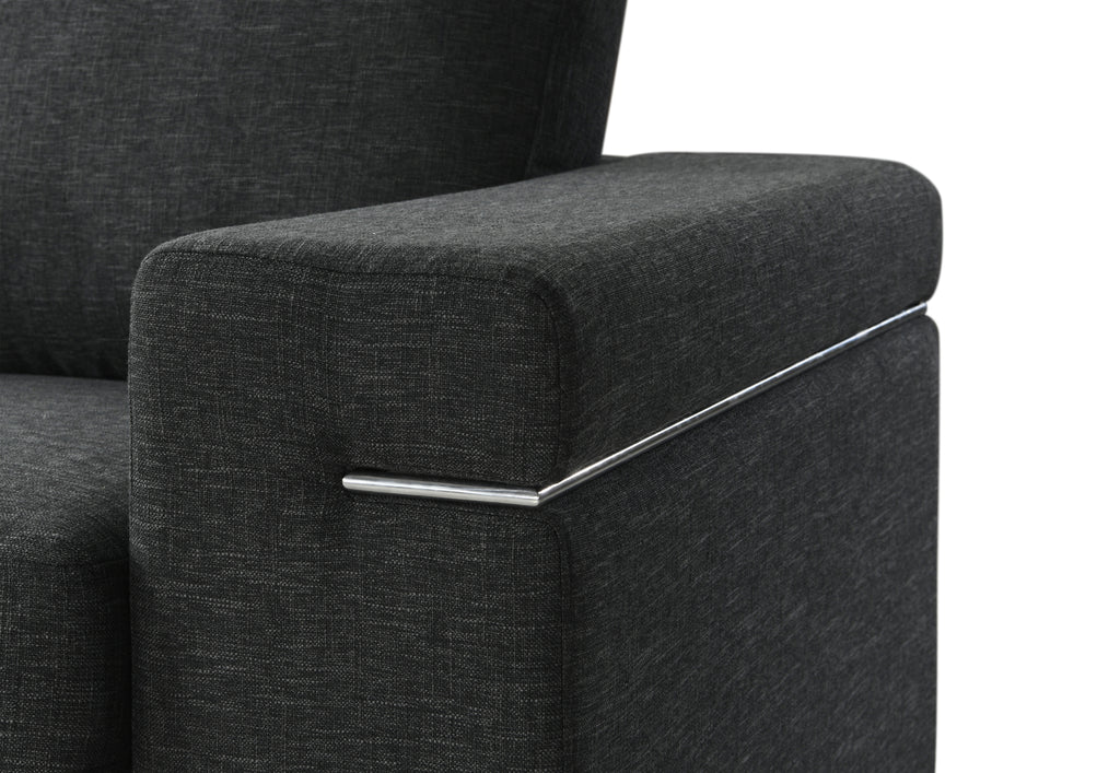 Side view of Gianna Black Linen Arm Chair armrest with chrome accent trim, emphasizing European design and refined craftsmanship.