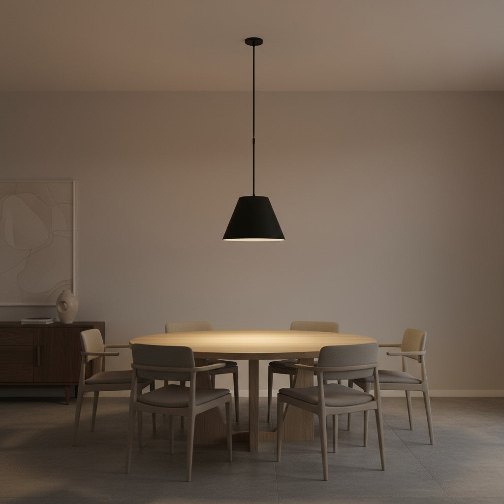 Single 16 inch LED black pendant light above a round dining table. Dimmable and stylish lighting for dining room ambiance.