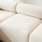 Close-up of the seat and backrest of the Evelyn U-Shaped Modular Sectional Sofa, highlighting the soft chenille texture and plush cushioning.