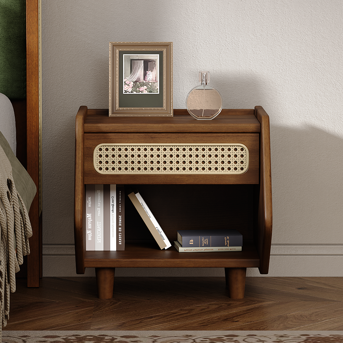 Mid-century modern walnut nightstand featuring a woven rattan drawer front, open storage shelf, and tapered legs.