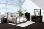 Antique Black Queen Size Bed with Gold Accents.