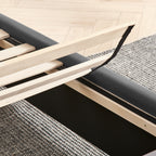 Detail of wooden slat support system on upholstered queen bed frame, showing easy assembly and no box spring requirement.