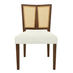 Front view of mid-century dining chair with white fabric seat and rattan backrest framed in dark wood for a stylish retro look.