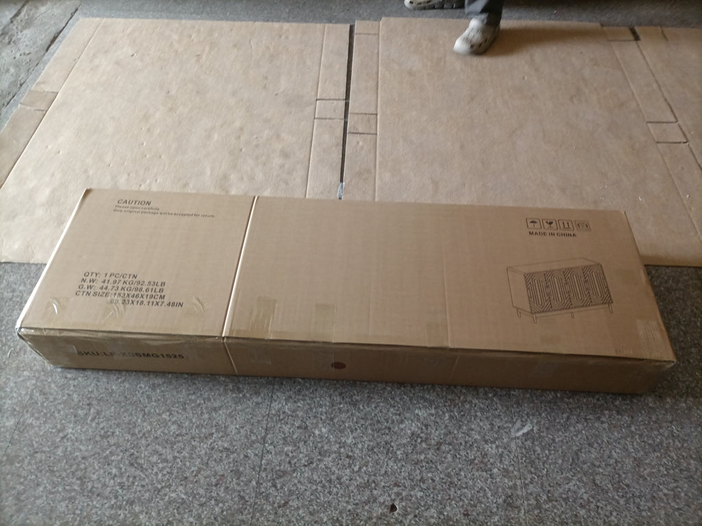 Cardboard packaging of walnut sideboard with printed product diagram and SKU, designed for safe and efficient shipping.