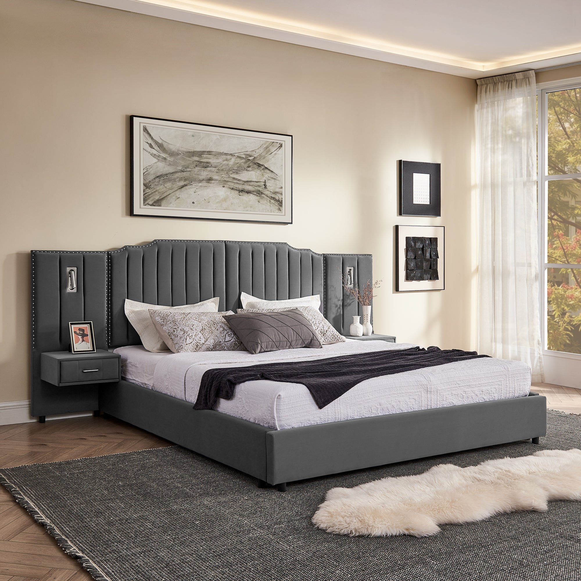King size bed frame in grey velvet with solid slatted base, upholstered headboard, and integrated side tables with drawers and lamps.
