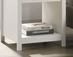 Bottom shelf of Celeste 1-Drawer Nightstand holding books. Open storage space enhances functionality in compact design.