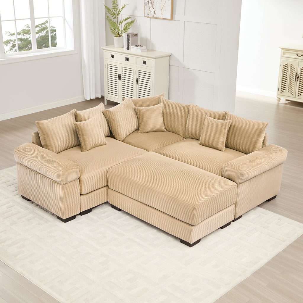 Oversized camel corduroy modular sectional sofa with deep seats, wide armrests, and multiple matching throw pillows.