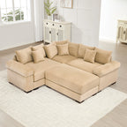 Oversized camel corduroy modular sectional sofa with deep seats, wide armrests, and multiple matching throw pillows.